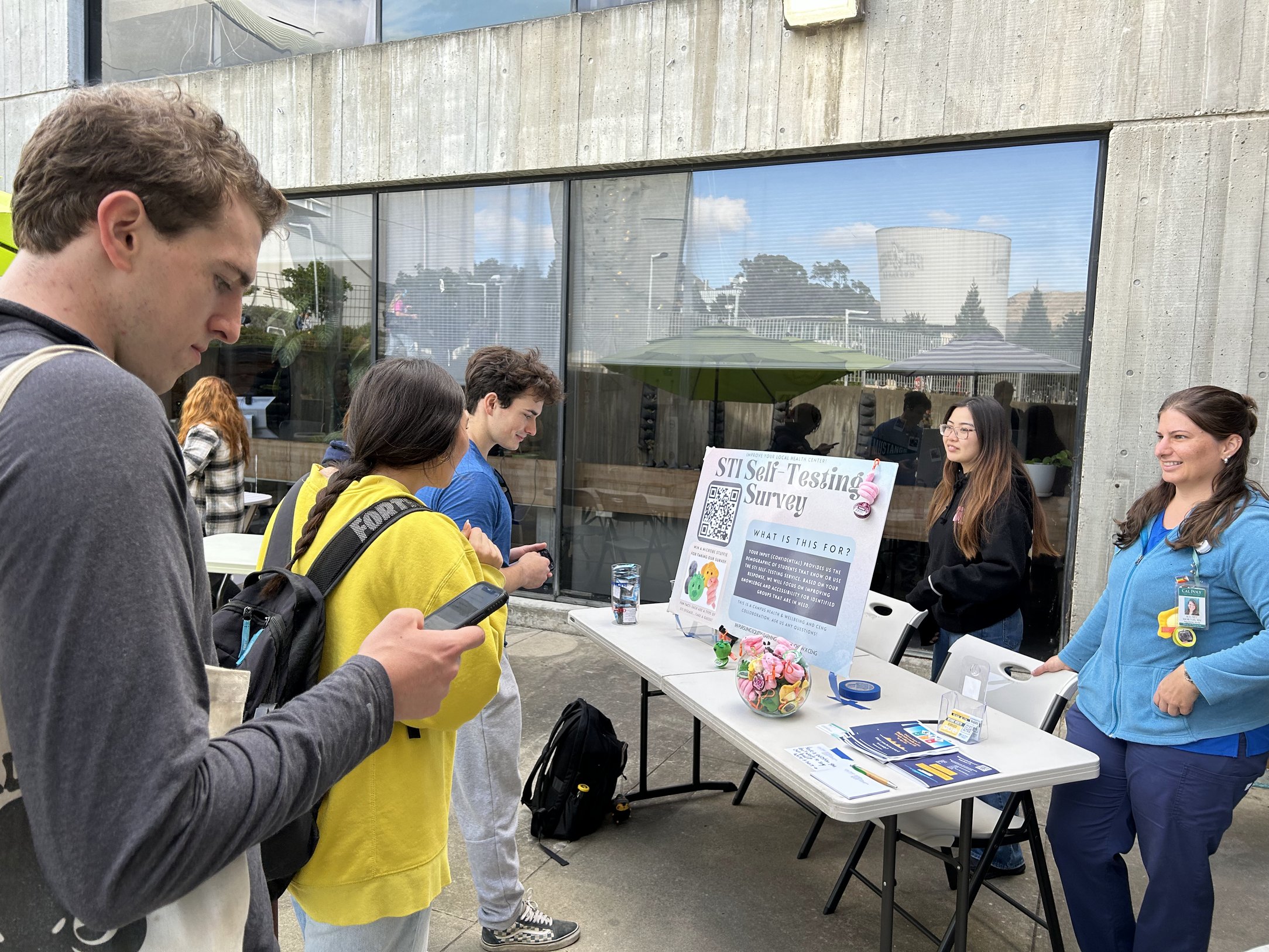 STI awareness campaign survey booth outside the health center